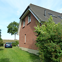 rot geklinkertes Haus, Blick Richtung Deich